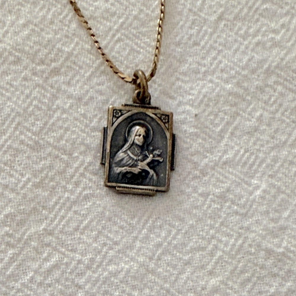 St. Therese pendent on gold chain Monet 3/$40